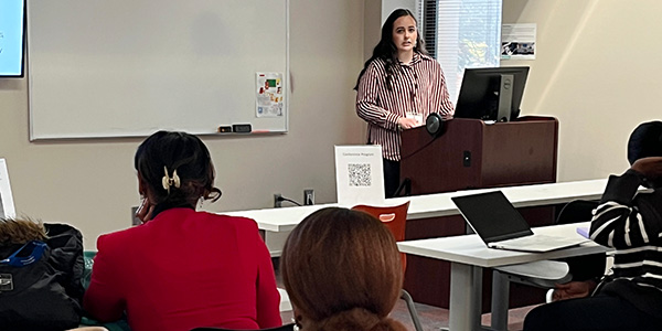 MGA student Candace Robards presenting her research on strategic communication.